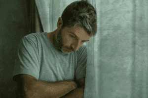 Man experiencing the signs of anxiety