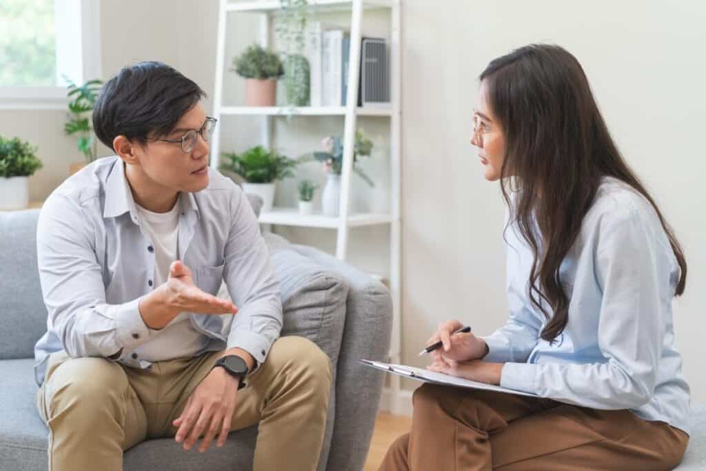 Two people talking about prescription drug rehab in Killeen, TX