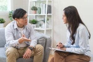 Two people talking about prescription drug rehab in Killeen, TX
